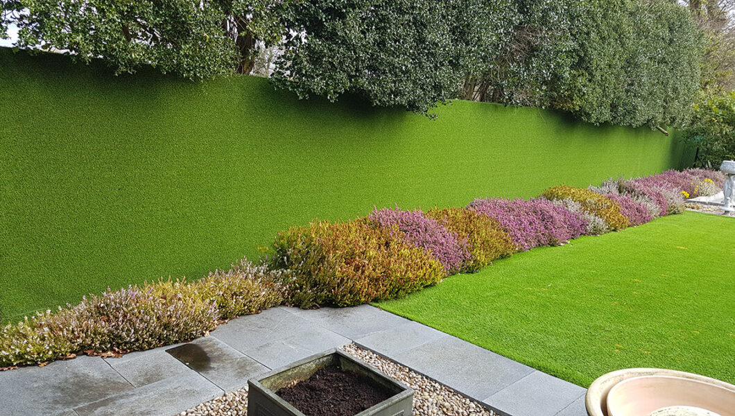 Artificial grass on lawn and wall