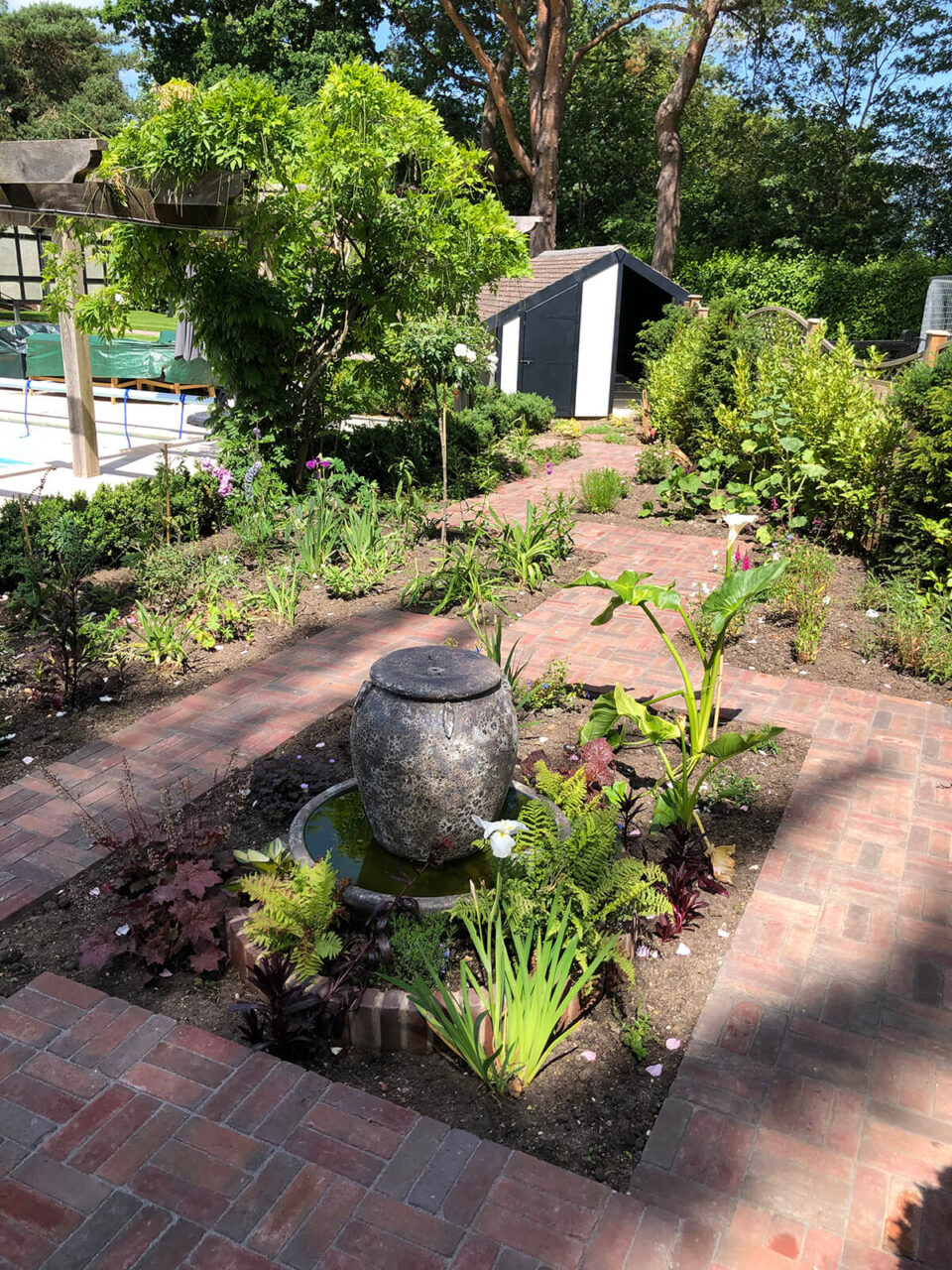 Lanscaped garden with paved paths and planting in Ashurst Hampshire