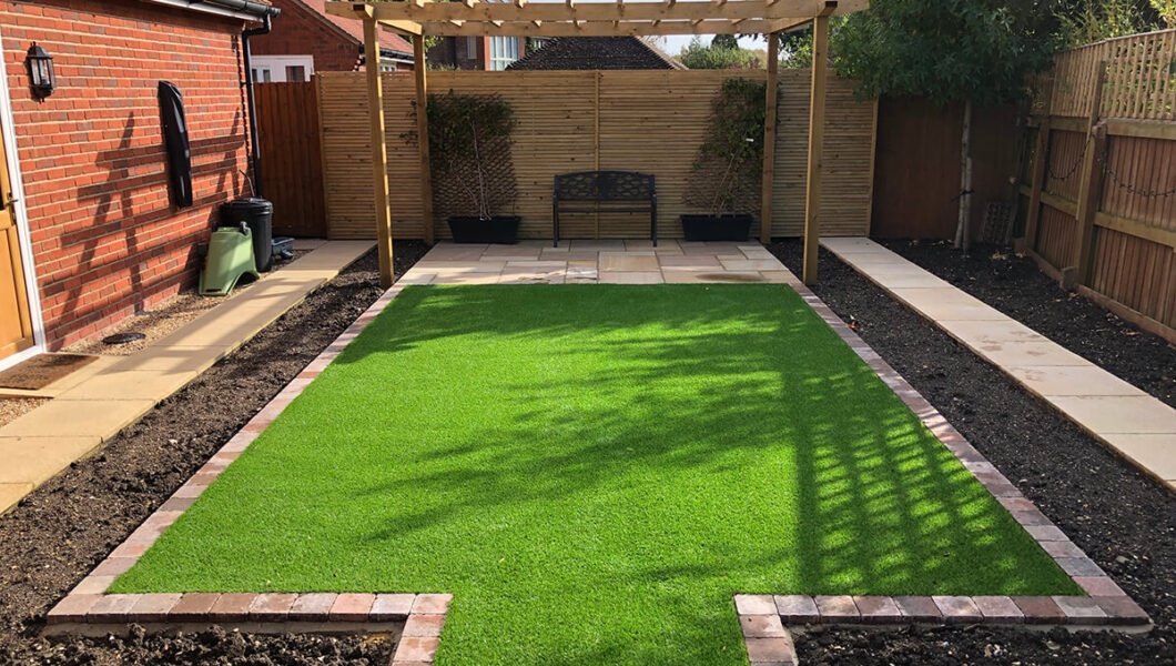 Garden design with pergola and artificial grass