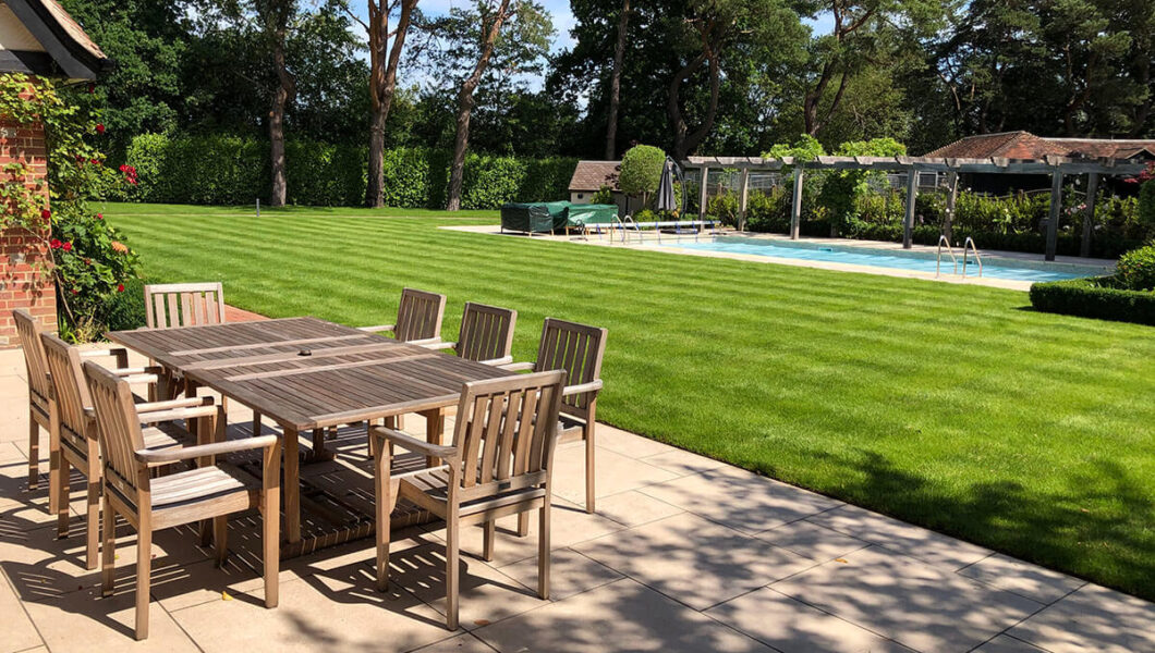 Paved patio area adjacent to lawn